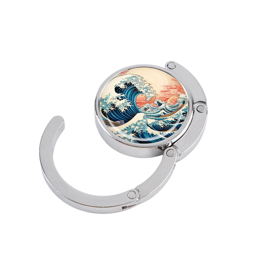 NOOX Blue Tide metal bag hanger with a Great Wave off Kanagawa art design, featuring a foldable magnetic mechanism.